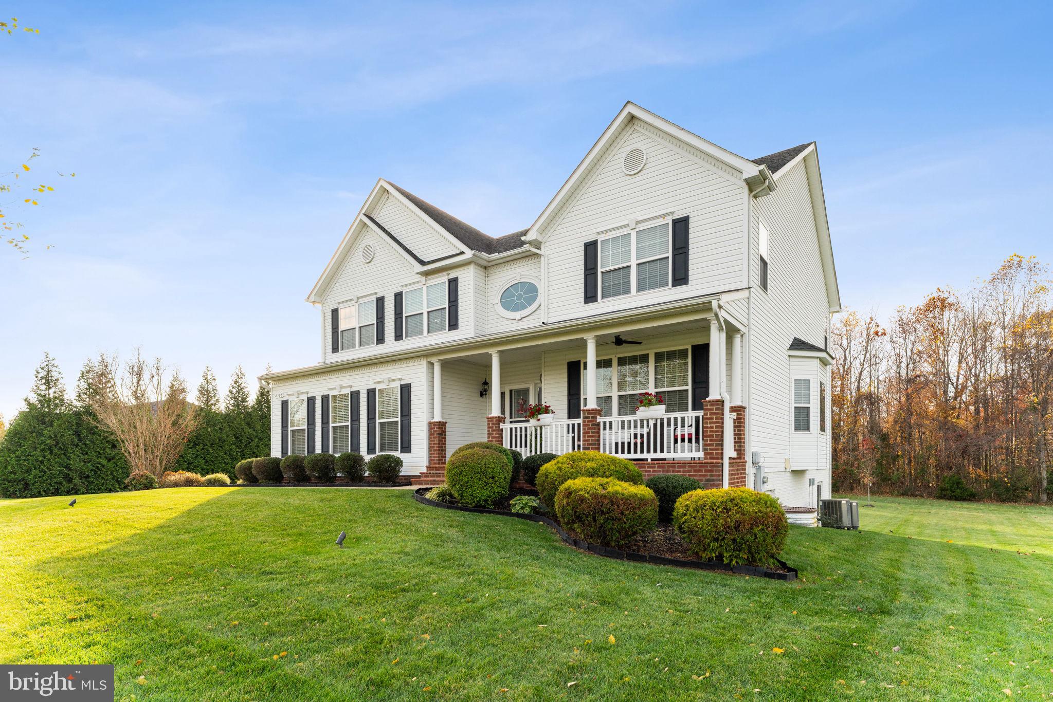 4505 Coachmans Path Court Waldorf, MD 20601 - Photo 5 of 71 a front view of a house with a garden