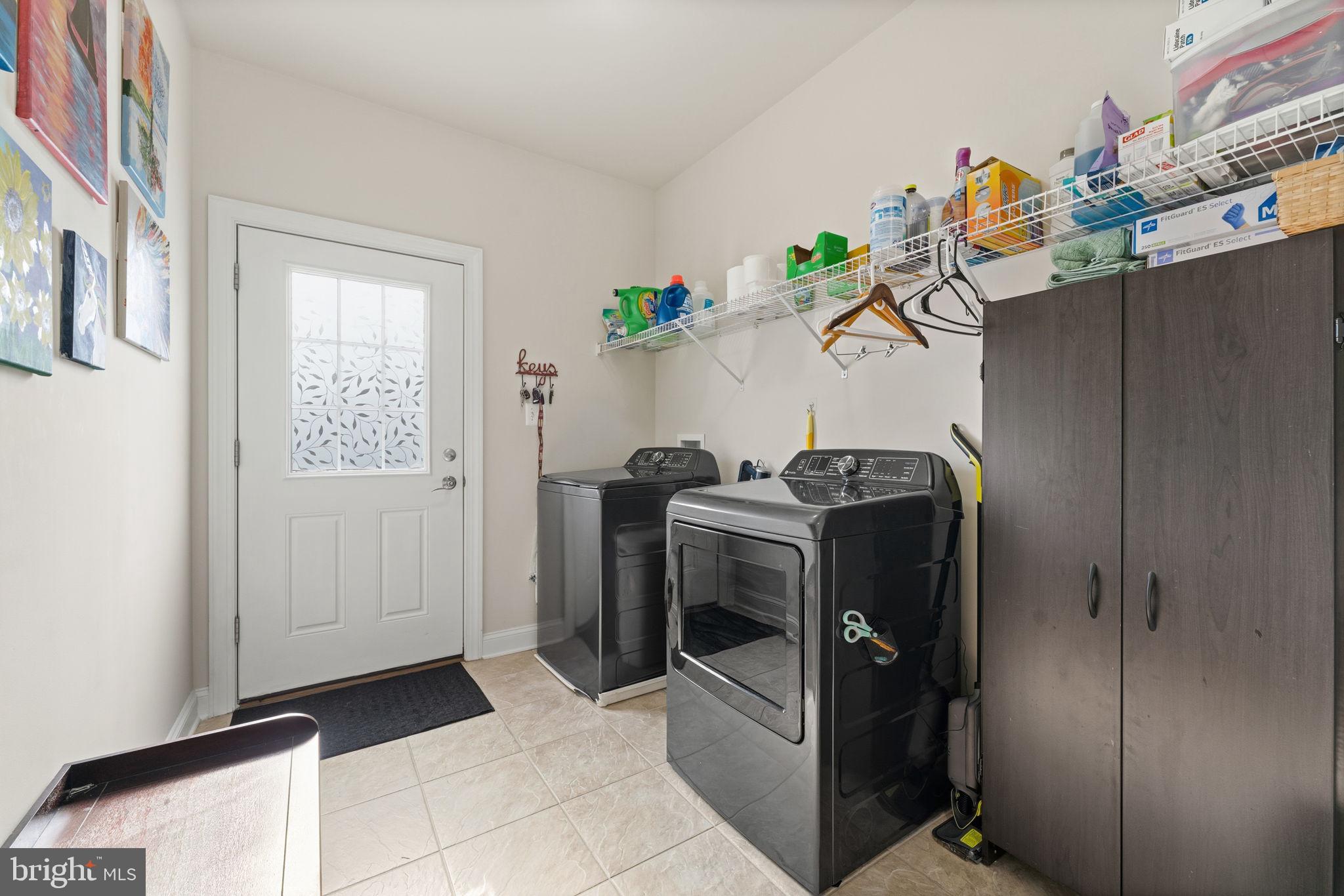 4505 Coachmans Path Court Waldorf, MD 20601 - Photo 53 of 71 a view of storage and utility room with washer and dryer