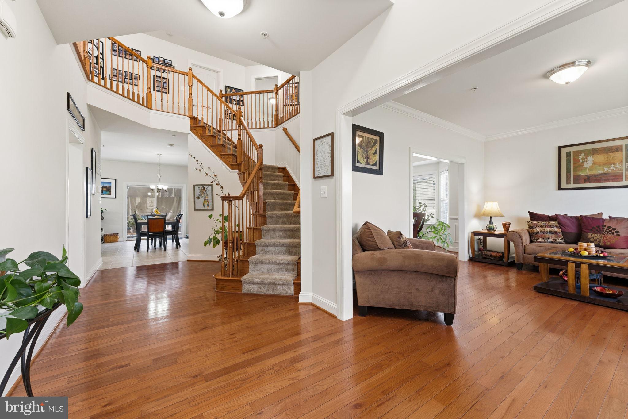 4505 Coachmans Path Court Waldorf, MD 20601 - Photo 9 of 71 a living room with furniture and wooden floor