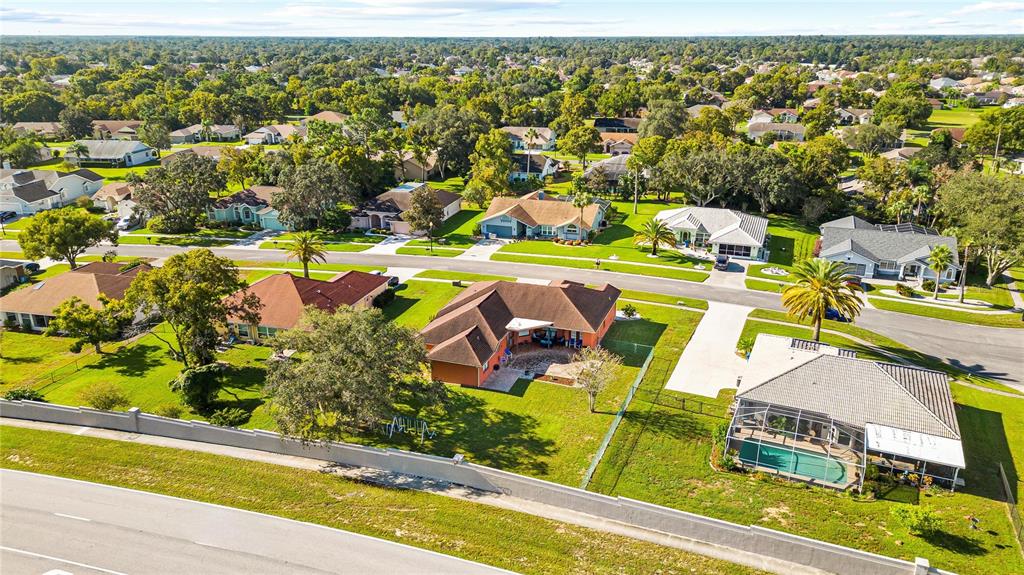 13481 Pullman Drive Spring Hill, FL 34609 - Photo 36 of 41 an aerial view of residential houses with outdoor space