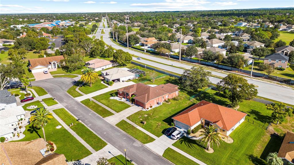 13481 Pullman Drive Spring Hill, FL 34609 - Photo 37 of 41 an aerial view of a pool patio patio and outdoor seating