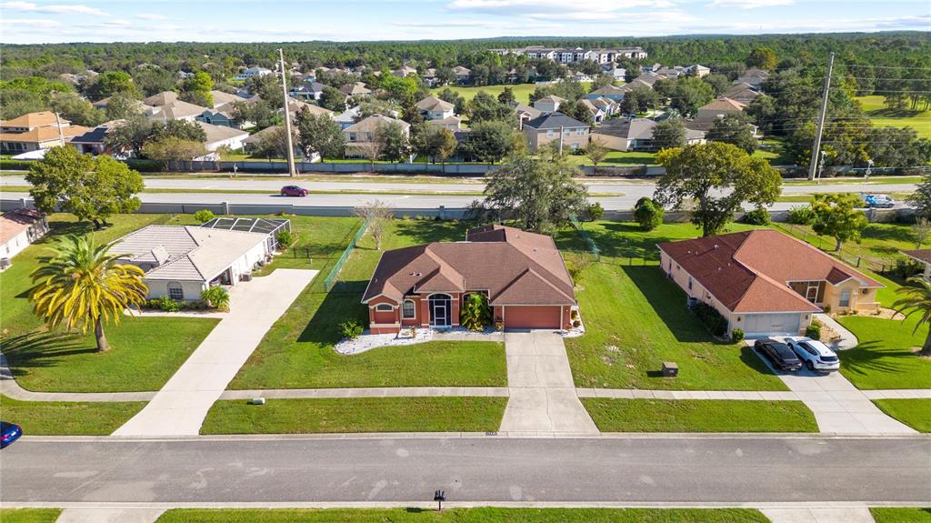 13481 Pullman Drive Spring Hill, FL 34609 - Photo 4 of 41 an aerial view of residential houses with outdoor space and swimming pool