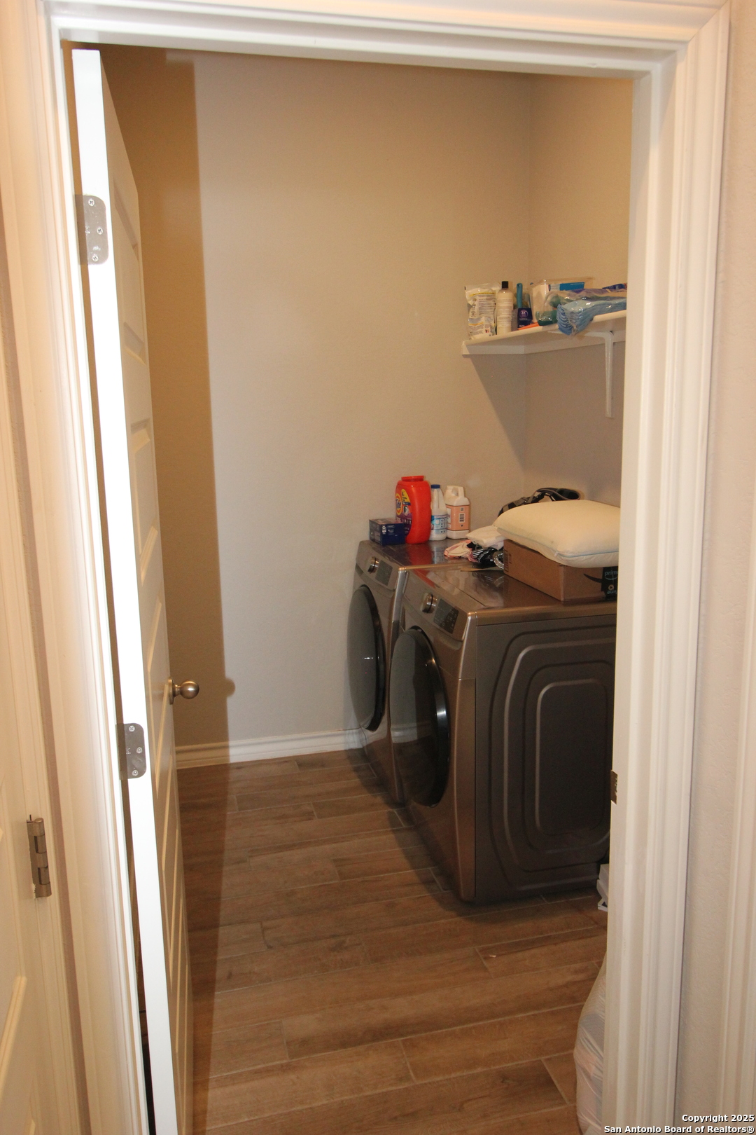 12228 Buckaroo Ranch San Antonio, TX 78254 - Photo 20 of 43 a utility room with dryer and washer