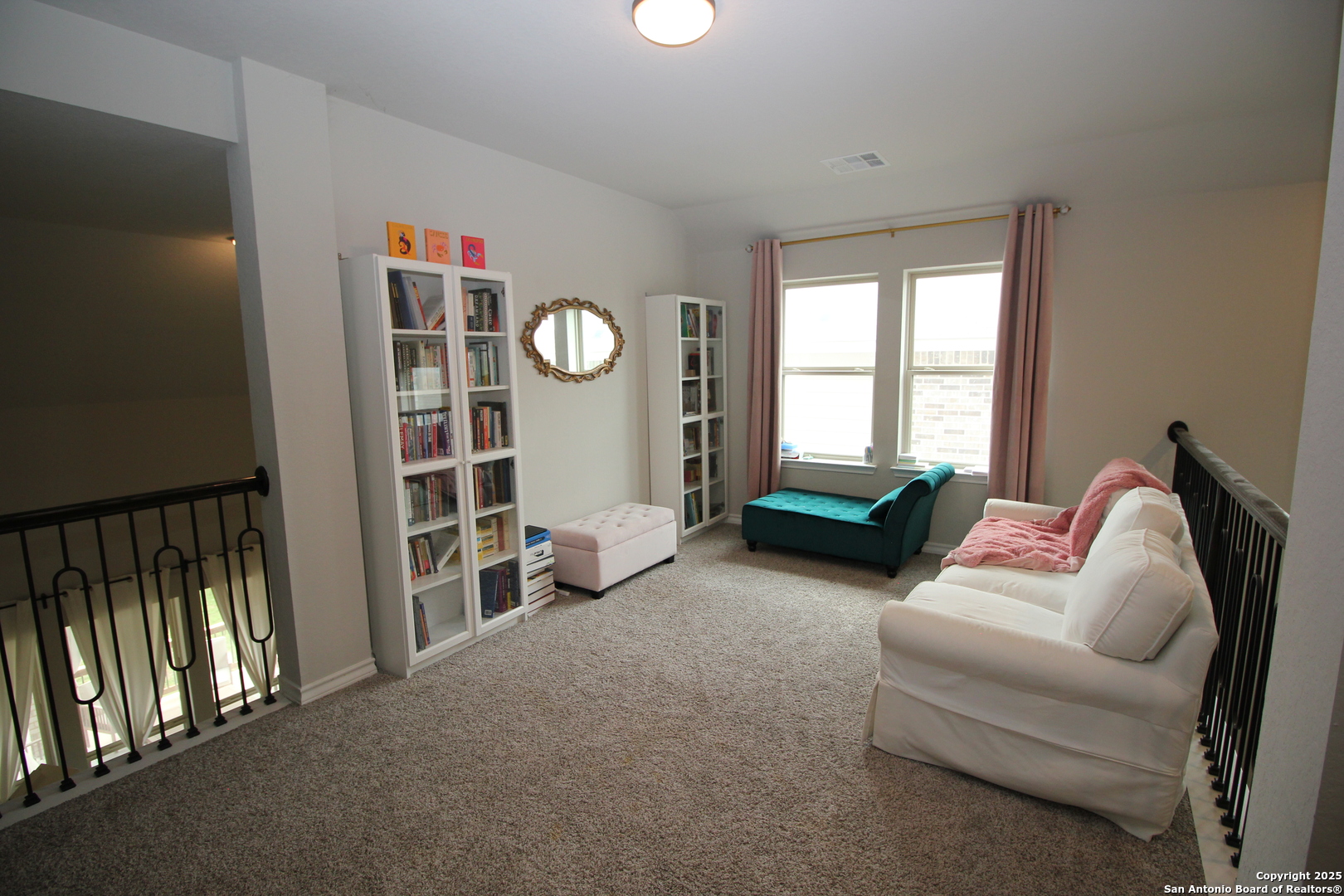 12228 Buckaroo Ranch San Antonio, TX 78254 - Photo 30 of 43 a living room with furniture and a window