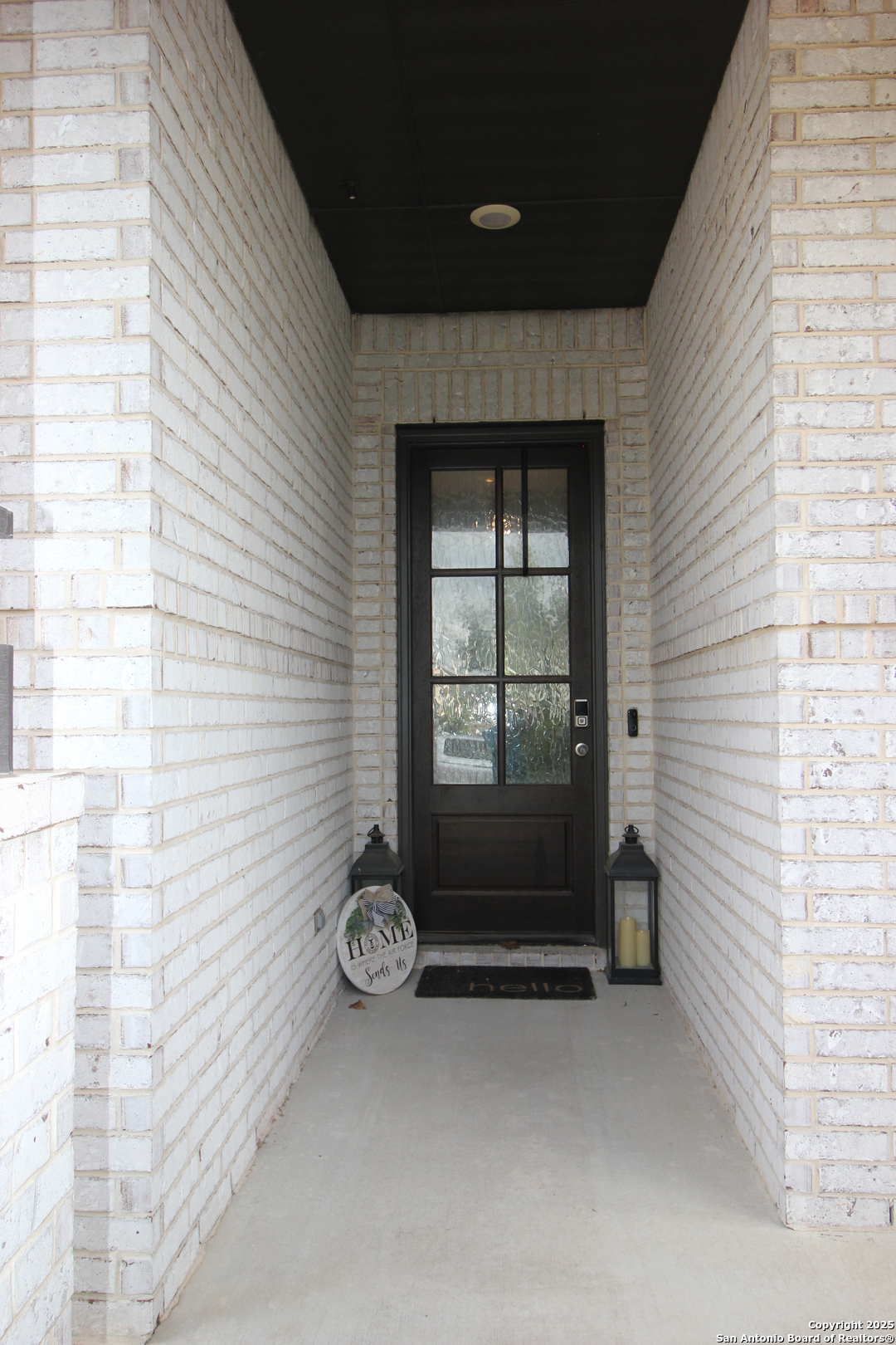 12228 Buckaroo Ranch San Antonio, TX 78254 - Photo 3 of 43 a view of a door and a window