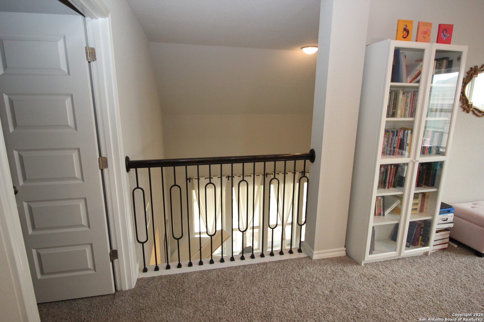 12228 Buckaroo Ranch San Antonio, TX 78254 - Photo 33 of 43 a view of a hallway with workspace