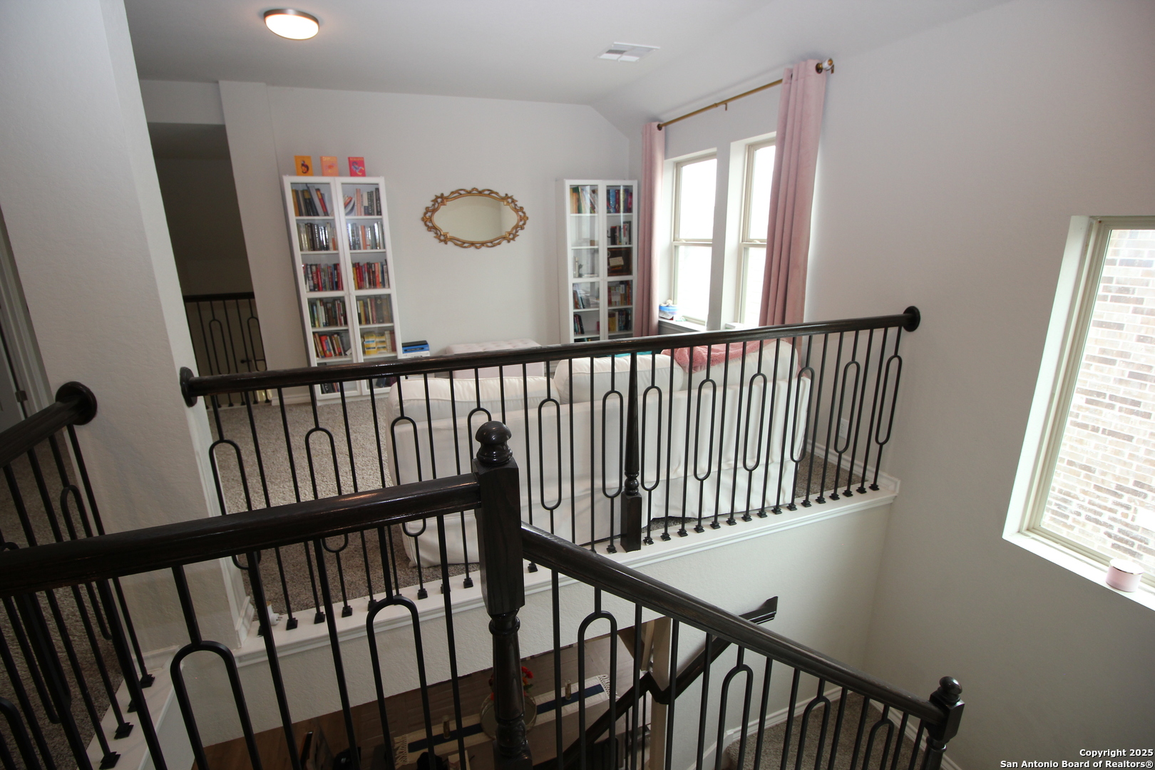 12228 Buckaroo Ranch San Antonio, TX 78254 - Photo 40 of 43 a view of staircase with railing and a window