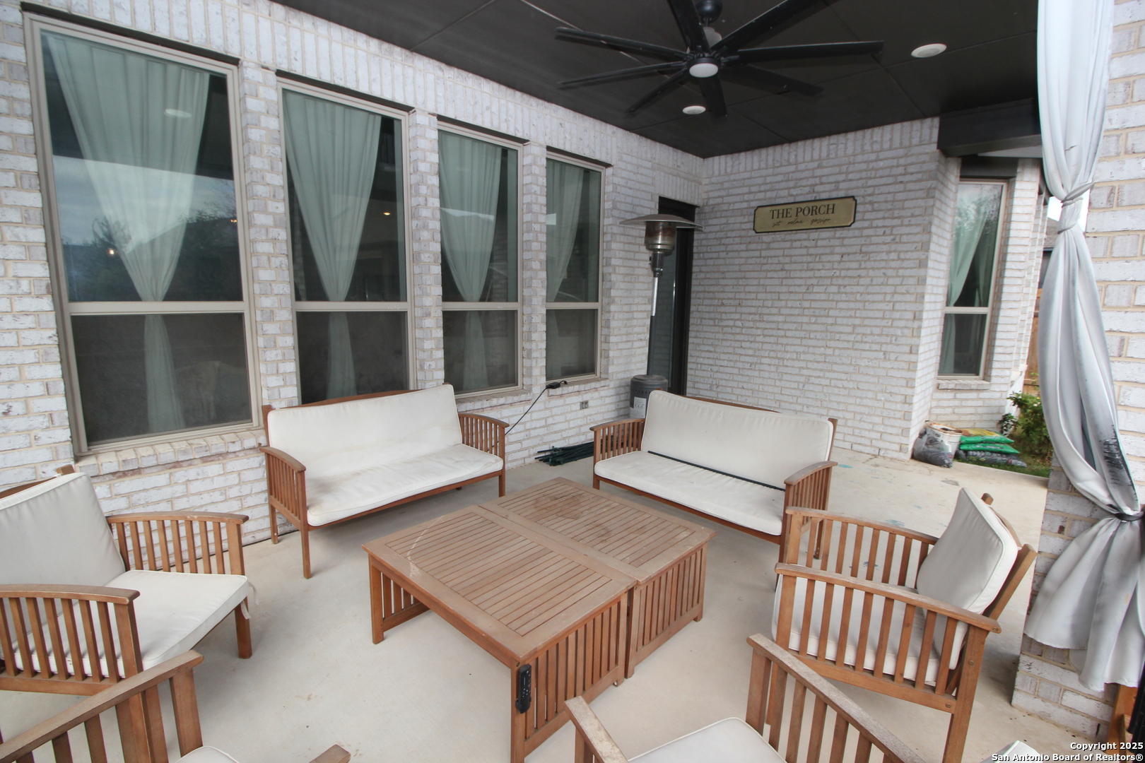 12228 Buckaroo Ranch San Antonio, TX 78254 - Photo 42 of 43 a balcony with table and chairs