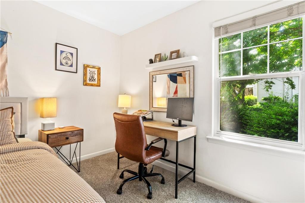 1150 Collier Road Northwest, Unit A10 Atlanta, GA 30318 - Photo 16 of 34 a workspace with furniture and a window
