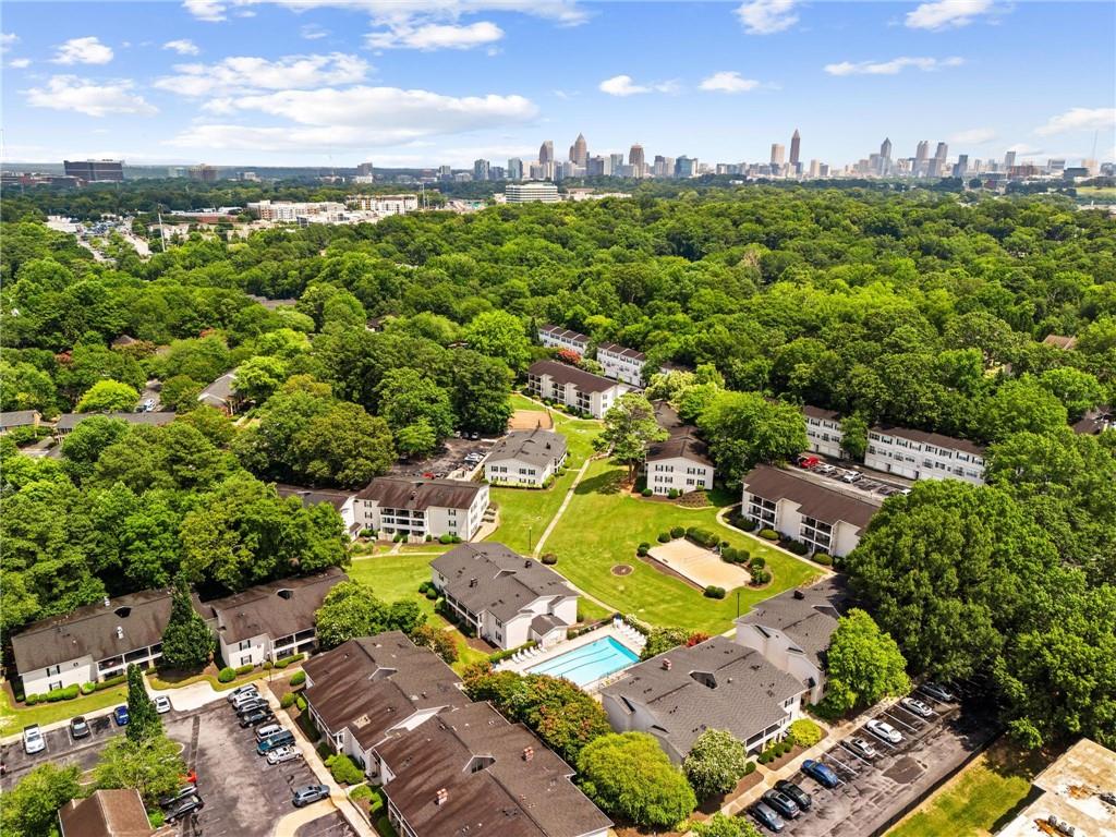 1150 Collier Road Northwest, Unit A10 Atlanta, GA 30318 - Photo 26 of 34 an aerial view of residential houses with outdoor space