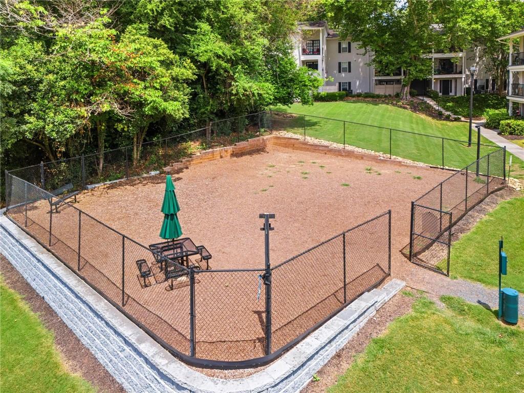 1150 Collier Road Northwest, Unit A10 Atlanta, GA 30318 - Photo 27 of 34 a view of swimming pool with a backyard