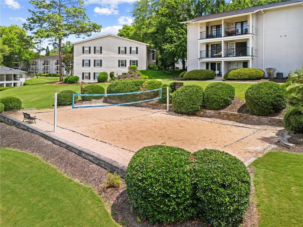1150 Collier Road Northwest, Unit A10 Atlanta, GA 30318 - Photo 29 of 34 a view of a garden with a house