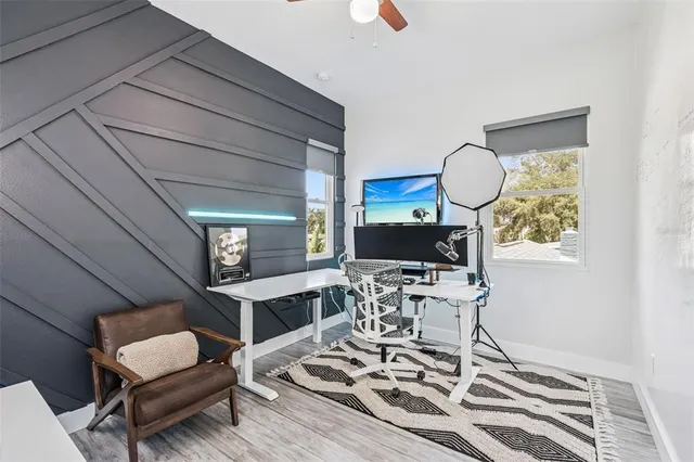 a bathroom with a double vanity sink toilet and shower