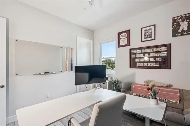 a bedroom with a bed and a dresser