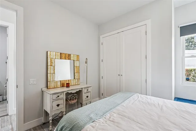 a en suite bathroom with a sink a mirror and a shower