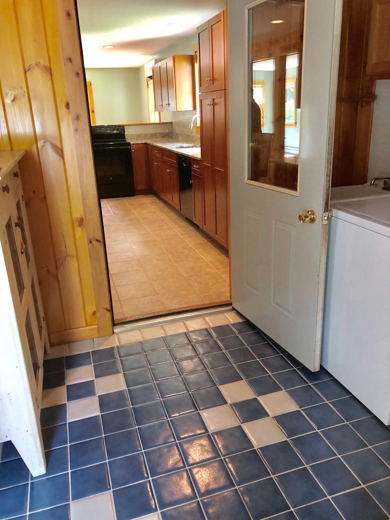 24 Ledges Road Bass Harbor, ME 04653 - Photo 9 of 61 Tiled entry and laundry area