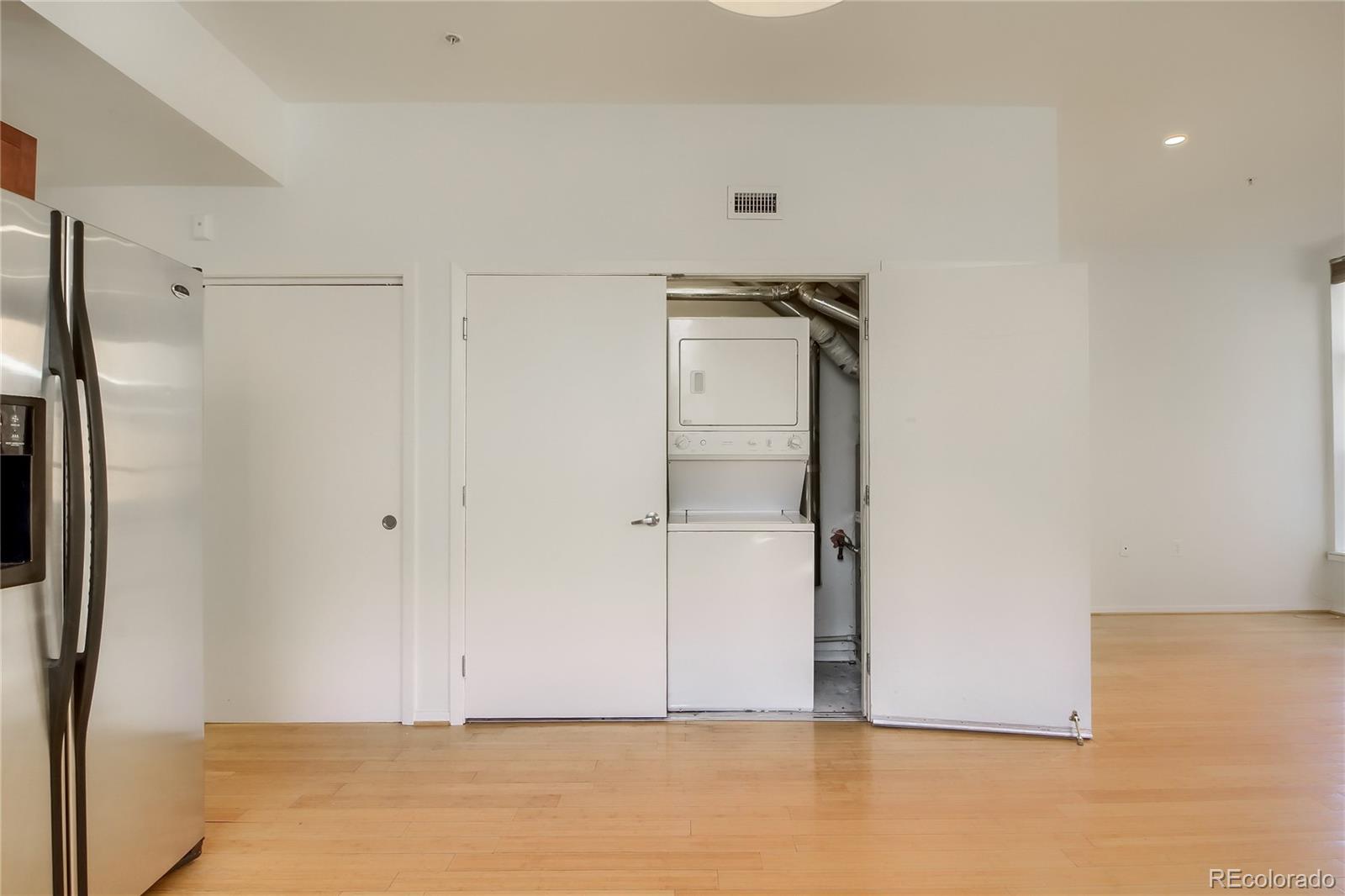 3225 Blake Street, Unit 2 Denver, CO 80205 - Photo 19 of 31 a view of an empty room