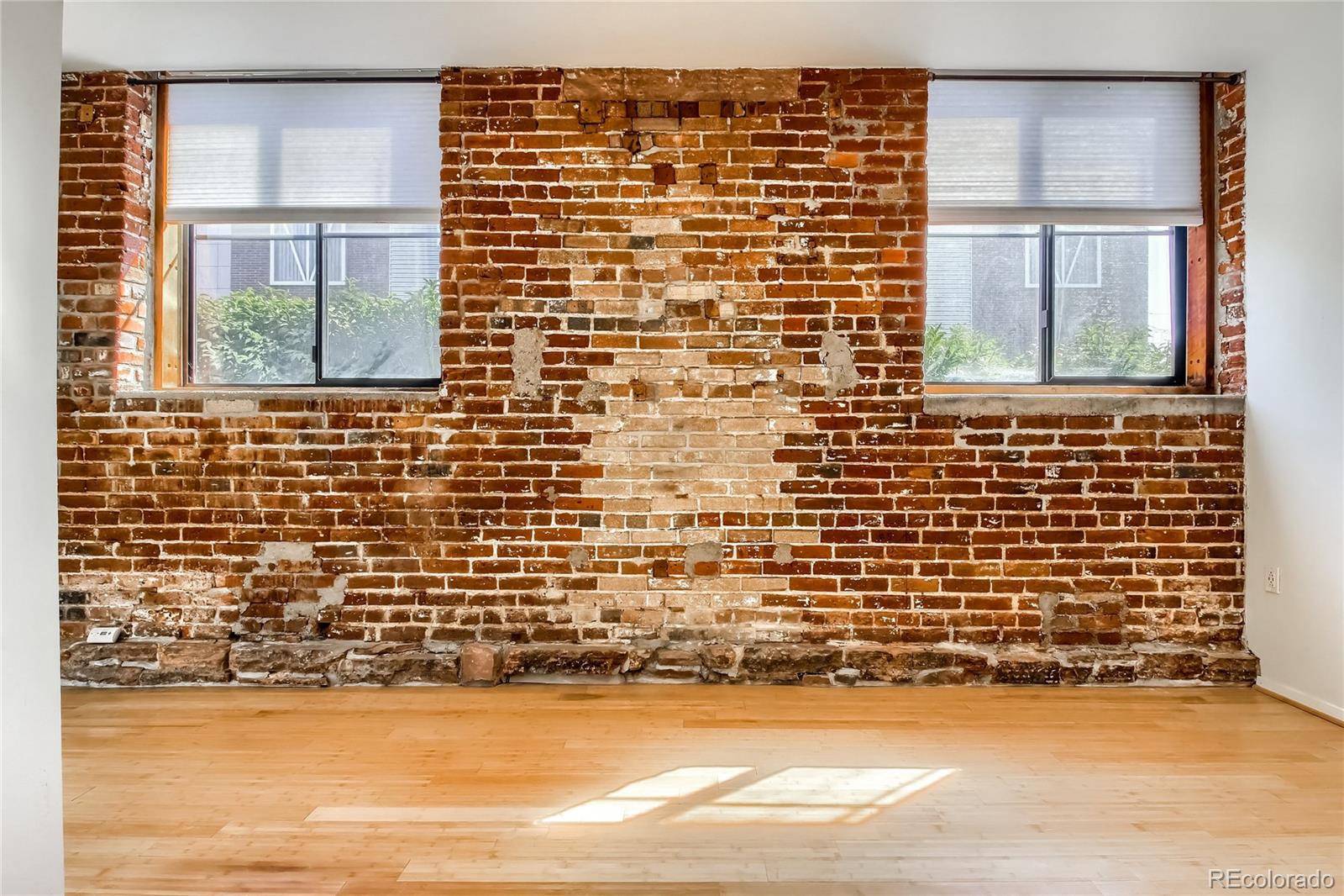 3225 Blake Street, Unit 2 Denver, CO 80205 - Photo 21 of 31 a view of front door and porch with wooden floor