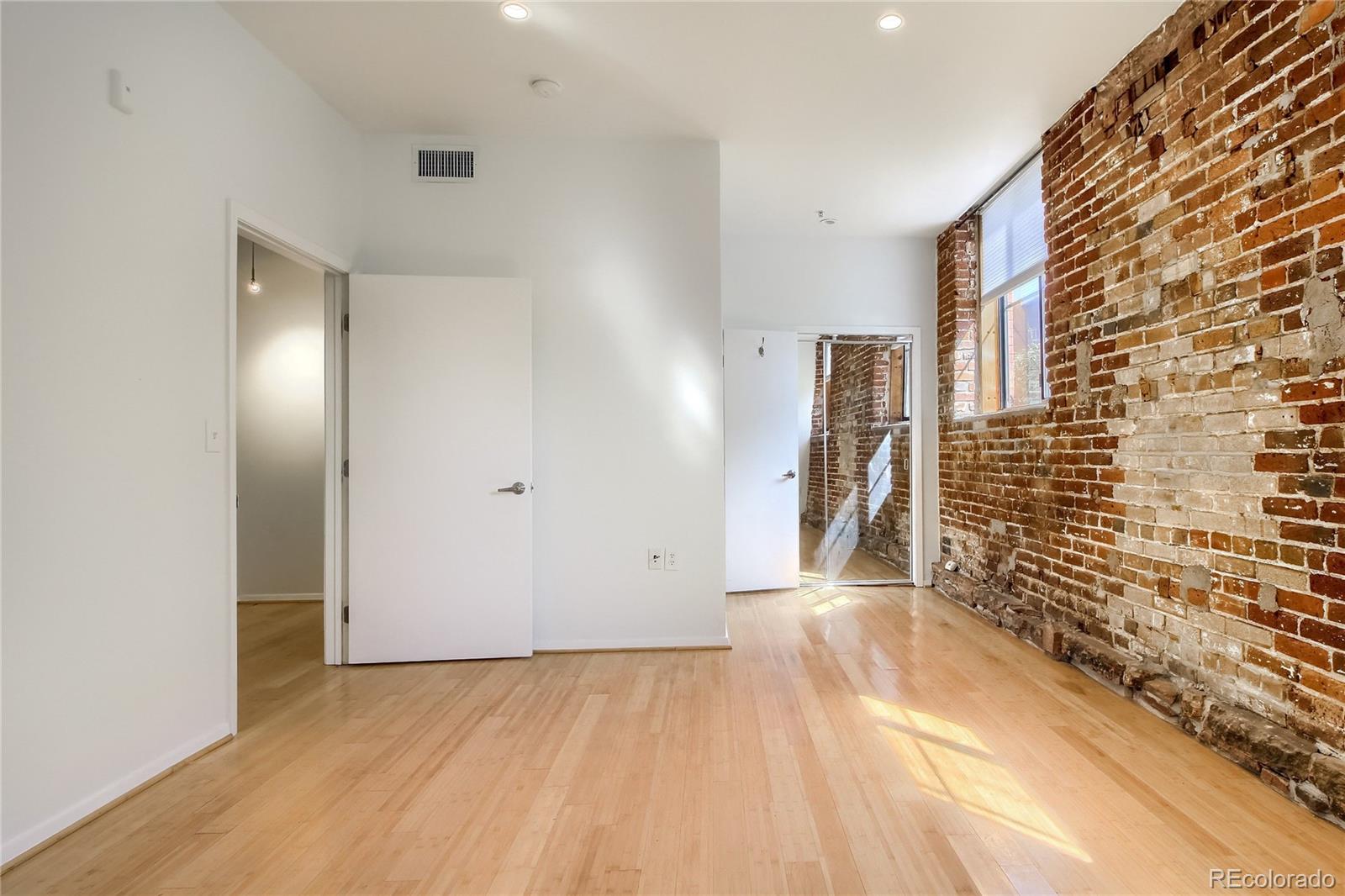 3225 Blake Street, Unit 2 Denver, CO 80205 - Photo 24 of 31 a view of hallway with stairs