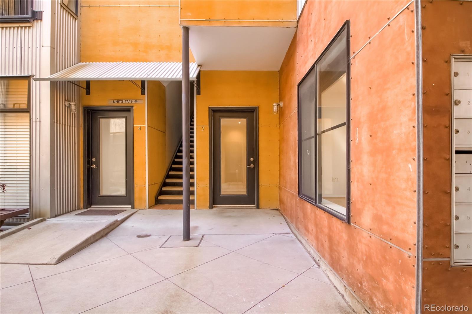 3225 Blake Street, Unit 2 Denver, CO 80205 - Photo 29 of 31 a view of an entrance to house with yard