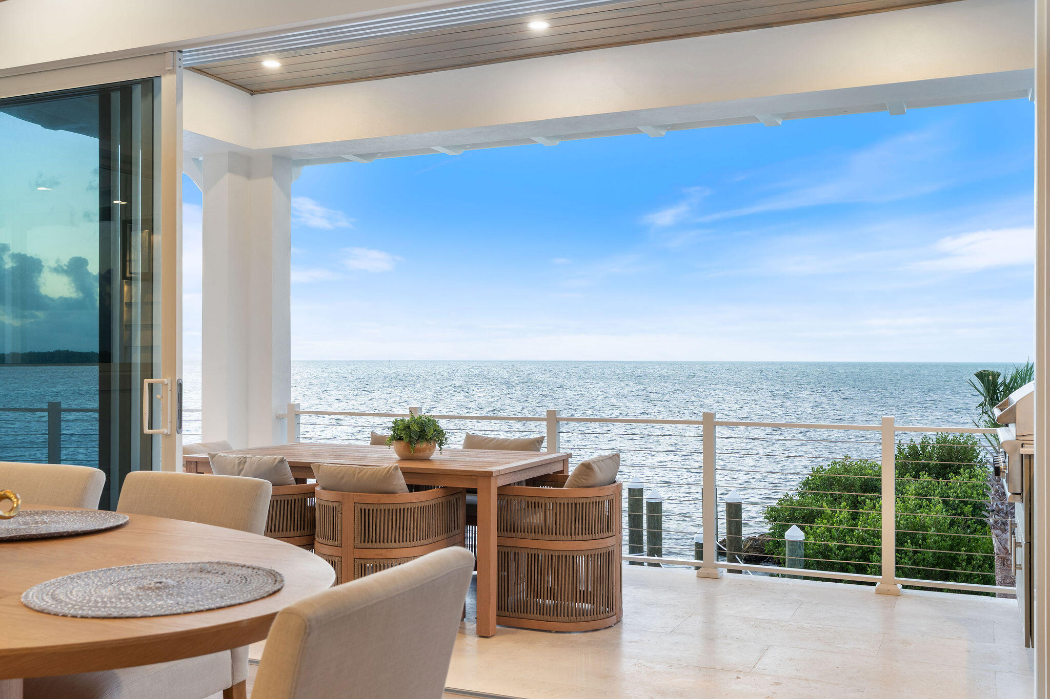 1002 Snapper Lane Key Largo, FL 33037 - Photo 10 of 106 a view of a terrace with furniture and outdoor view