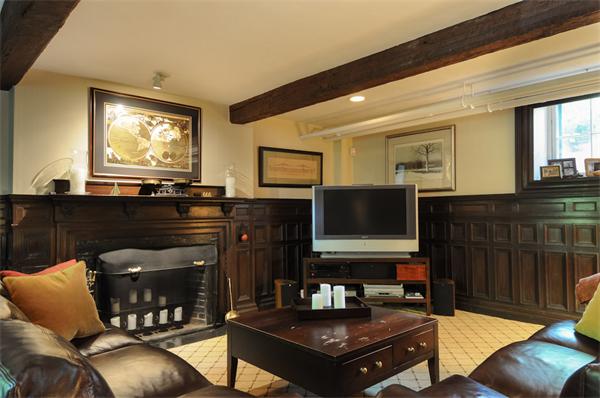 113 Cliff Road Wellesley, MA 02481 - Photo 16 of 25 a living room with furniture and a flat screen tv