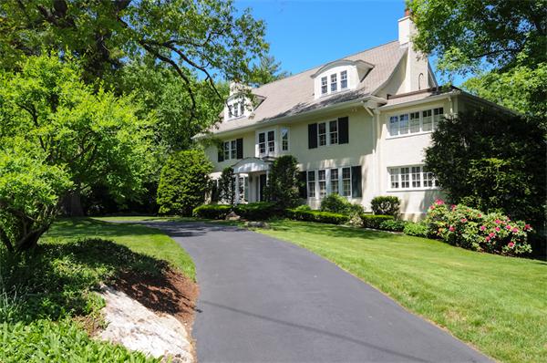 113 Cliff Road Wellesley, MA 02481 - Photo 24 of 25 a front view of a house with a garden