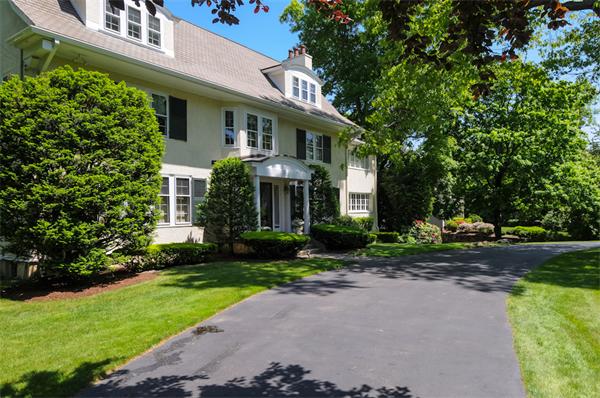 113 Cliff Road Wellesley, MA 02481 - Photo 25 of 25 a front view of a house with a yard and trees