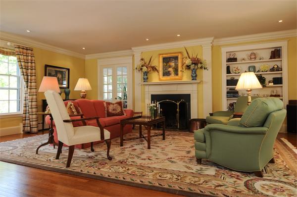 113 Cliff Road Wellesley, MA 02481 - Photo 4 of 25 a living room with furniture and a fireplace