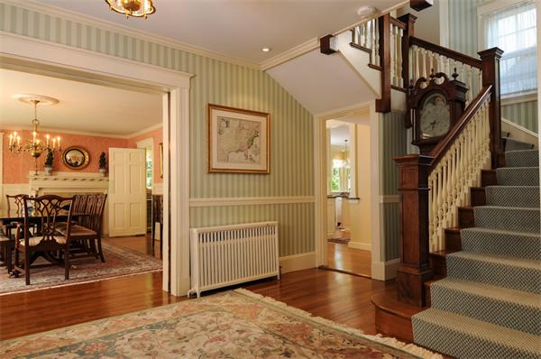 113 Cliff Road Wellesley, MA 02481 - Photo 6 of 25 a view of entryway and hall with wooden floor