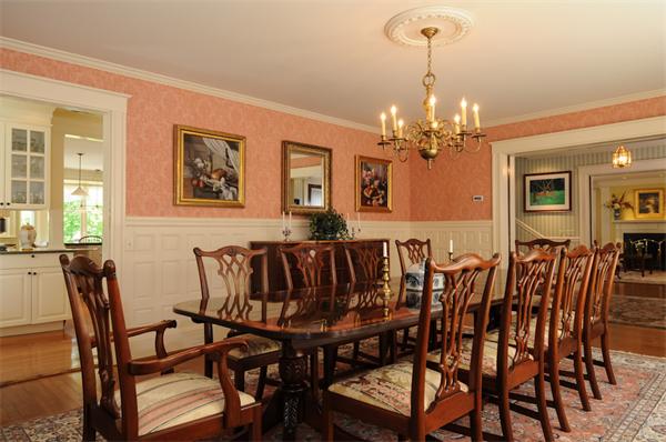 113 Cliff Road Wellesley, MA 02481 - Photo 7 of 25 a view of a dining room with furniture and chandelier