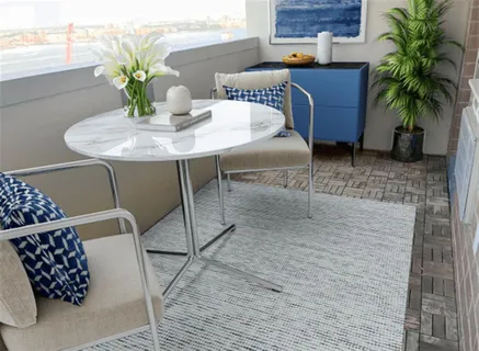 a dining room with furniture and potted plants