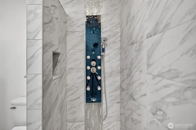 a view of entryway with wooden floor and a livingroom view