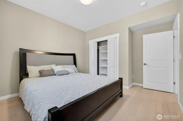 a view of a house with a yard and pathway