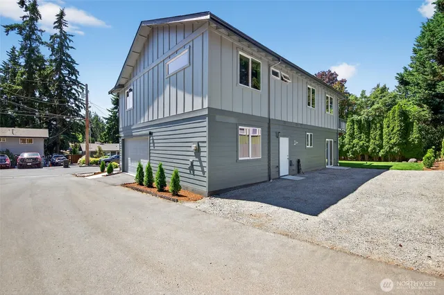 a view of a house with a street