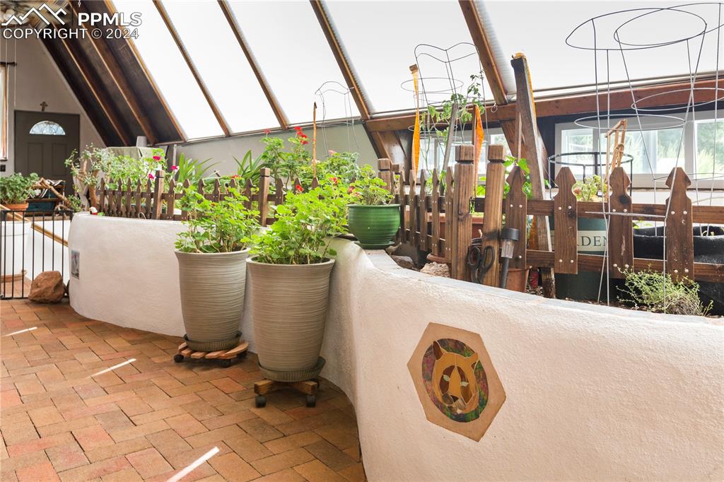 654 Tess Trace Road Guffey, CO 80820 - Photo 12 of 42 a view of a porch with a table and chairs