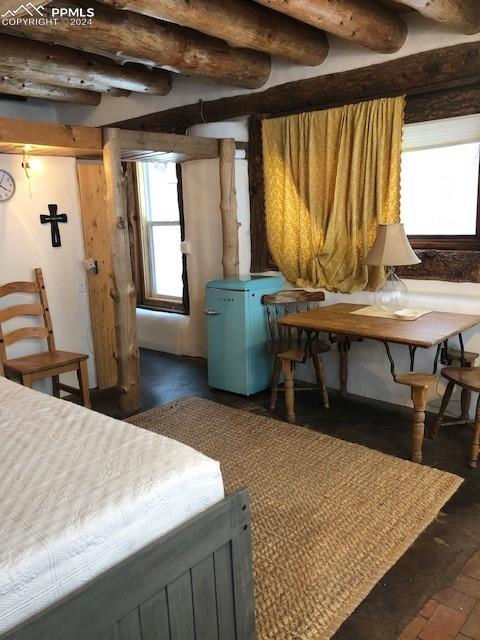 654 Tess Trace Road Guffey, CO 80820 - Photo 16 of 42 a dining room with a table and chairs