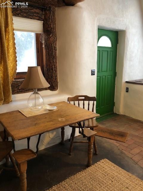 654 Tess Trace Road Guffey, CO 80820 - Photo 18 of 42 a view of a dining room with furniture and window
