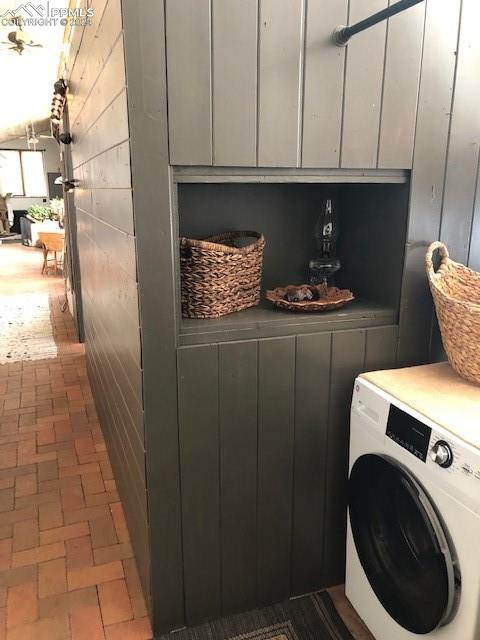 654 Tess Trace Road Guffey, CO 80820 - Photo 20 of 42 a utility room with dryer and washer