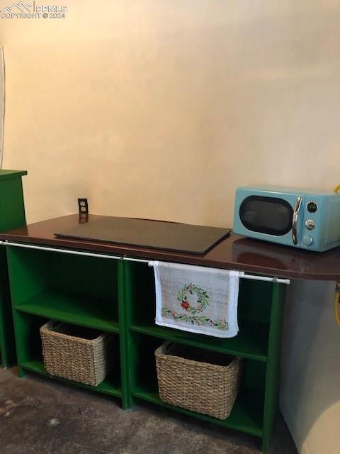 654 Tess Trace Road Guffey, CO 80820 - Photo 26 of 42 a front view of a house with dishwasher and wooden floor