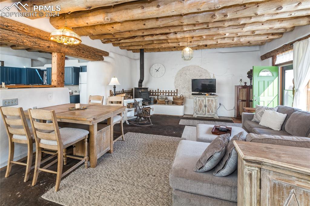 654 Tess Trace Road Guffey, CO 80820 - Photo 10 of 42 a living room with furniture and a large window