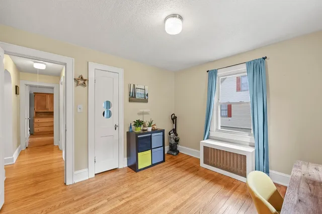 a bedroom with a bed and a view of bathroom