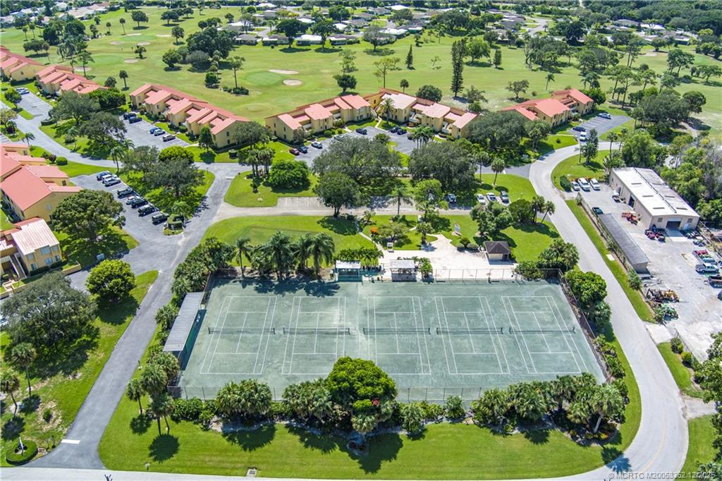 5313 Southeast Miles Grant Road, Unit K209 Stuart, FL 34997 - Photo 29 of 34 a view of a garden with an empty room