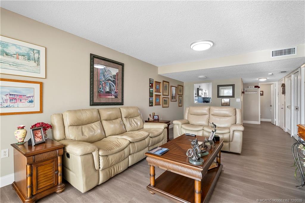 5313 Southeast Miles Grant Road, Unit K209 Stuart, FL 34997 - Photo 6 of 34 a living room with furniture