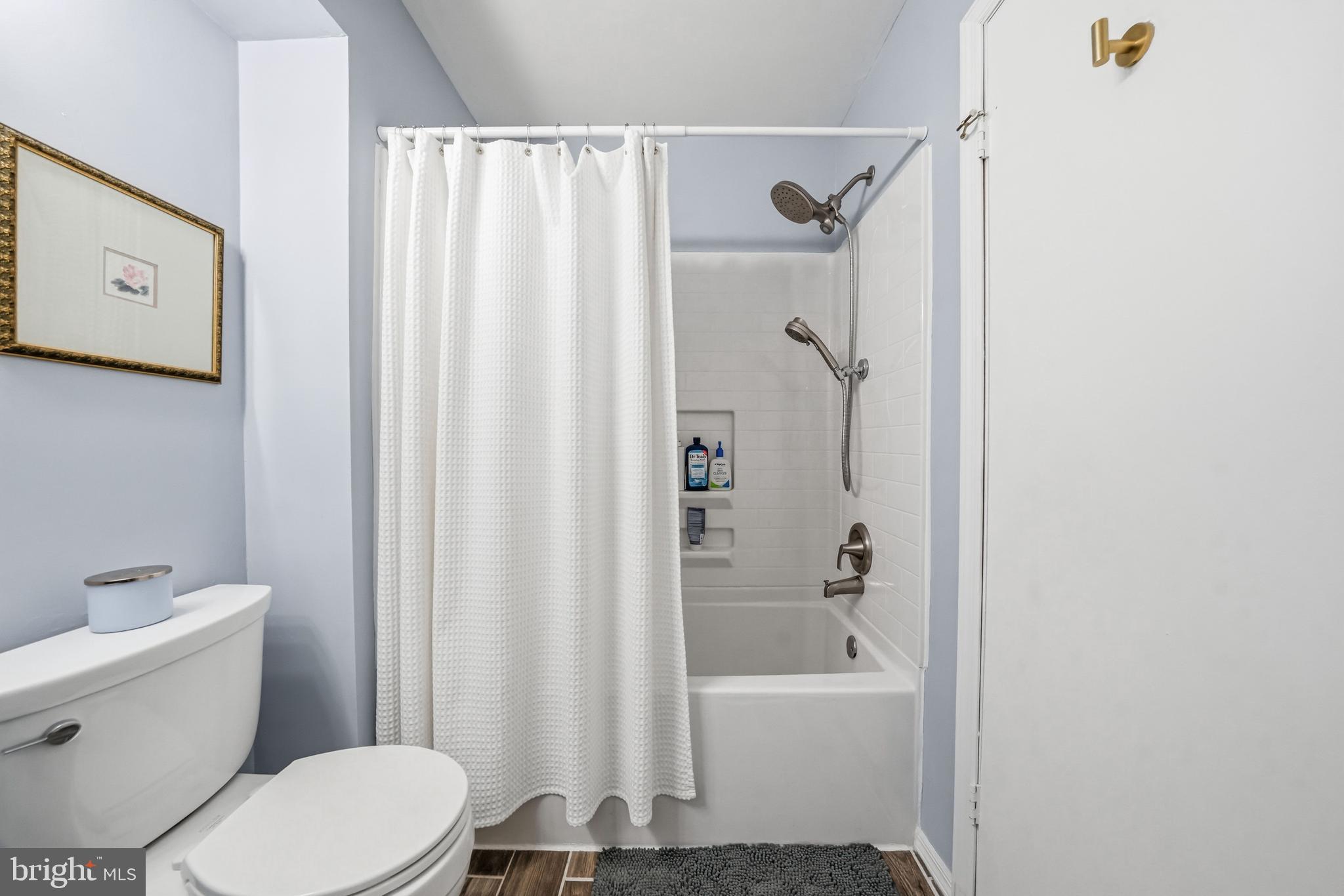 3305A Ramsbury Court Mount Laurel, NJ 08054 - Photo 18 of 27 a bathroom with a toilet and a bathtub