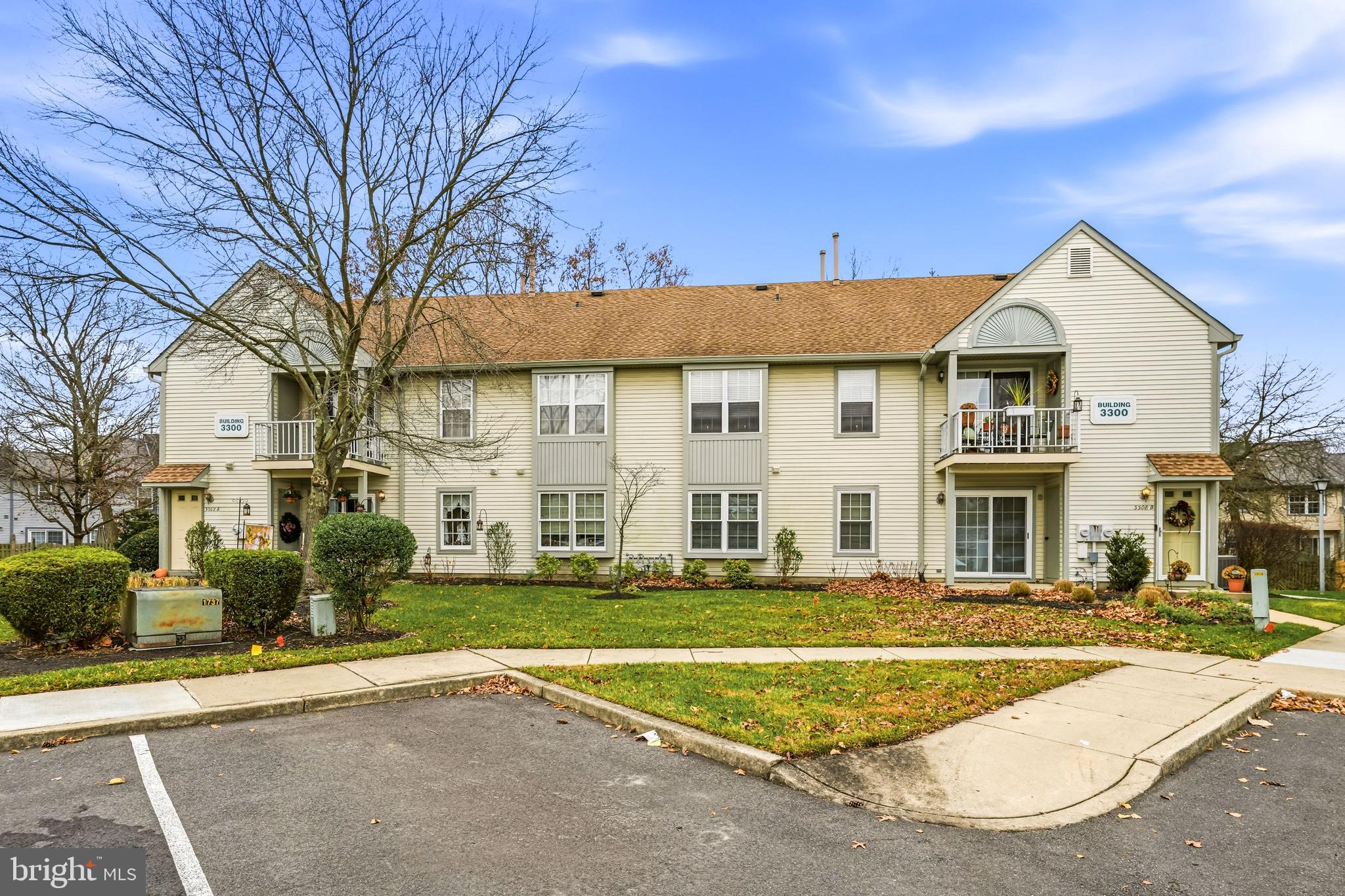 3305A Ramsbury Court Mount Laurel, NJ 08054 - Photo 4 of 27 a front view of a house with a yard
