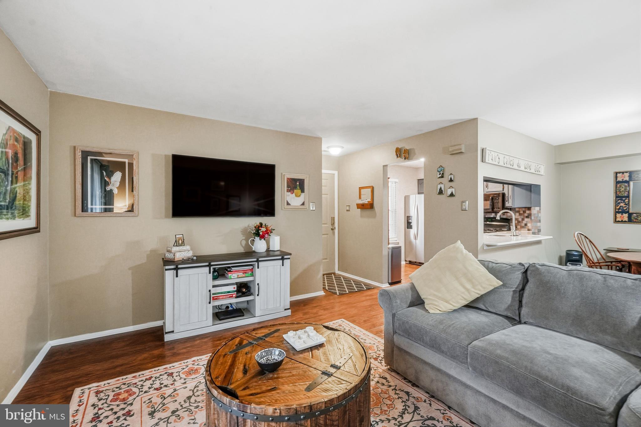 3305A Ramsbury Court Mount Laurel, NJ 08054 - Photo 6 of 27 a living room with furniture and a flat screen tv