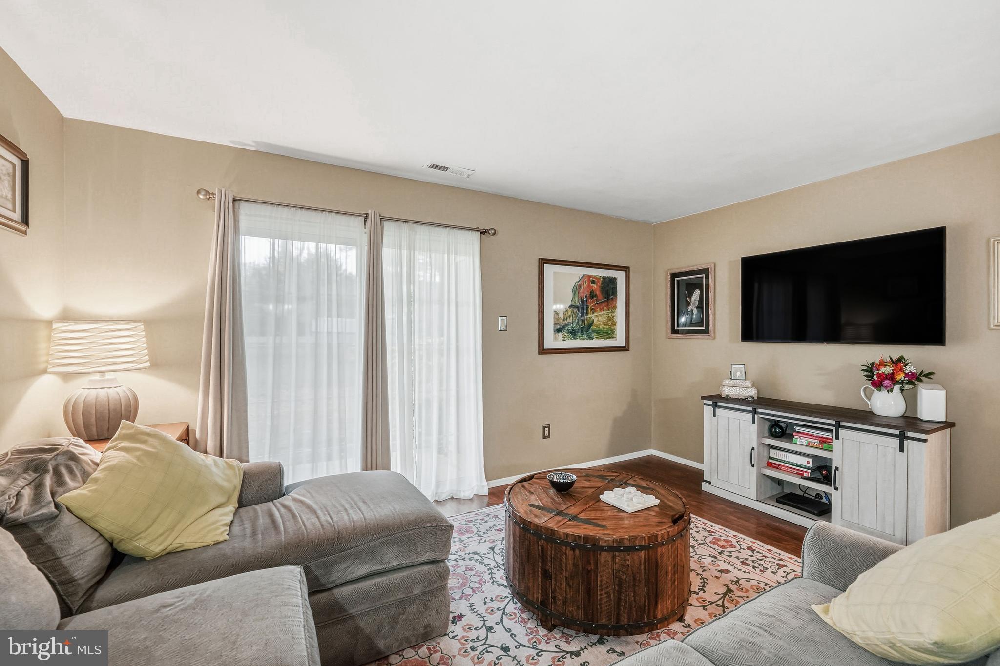 3305A Ramsbury Court Mount Laurel, NJ 08054 - Photo 7 of 27 a living room with furniture and a flat screen tv