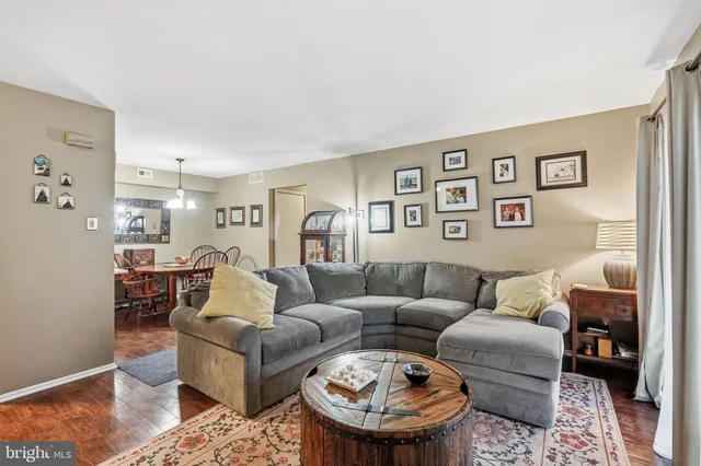 a living room with furniture and a couch