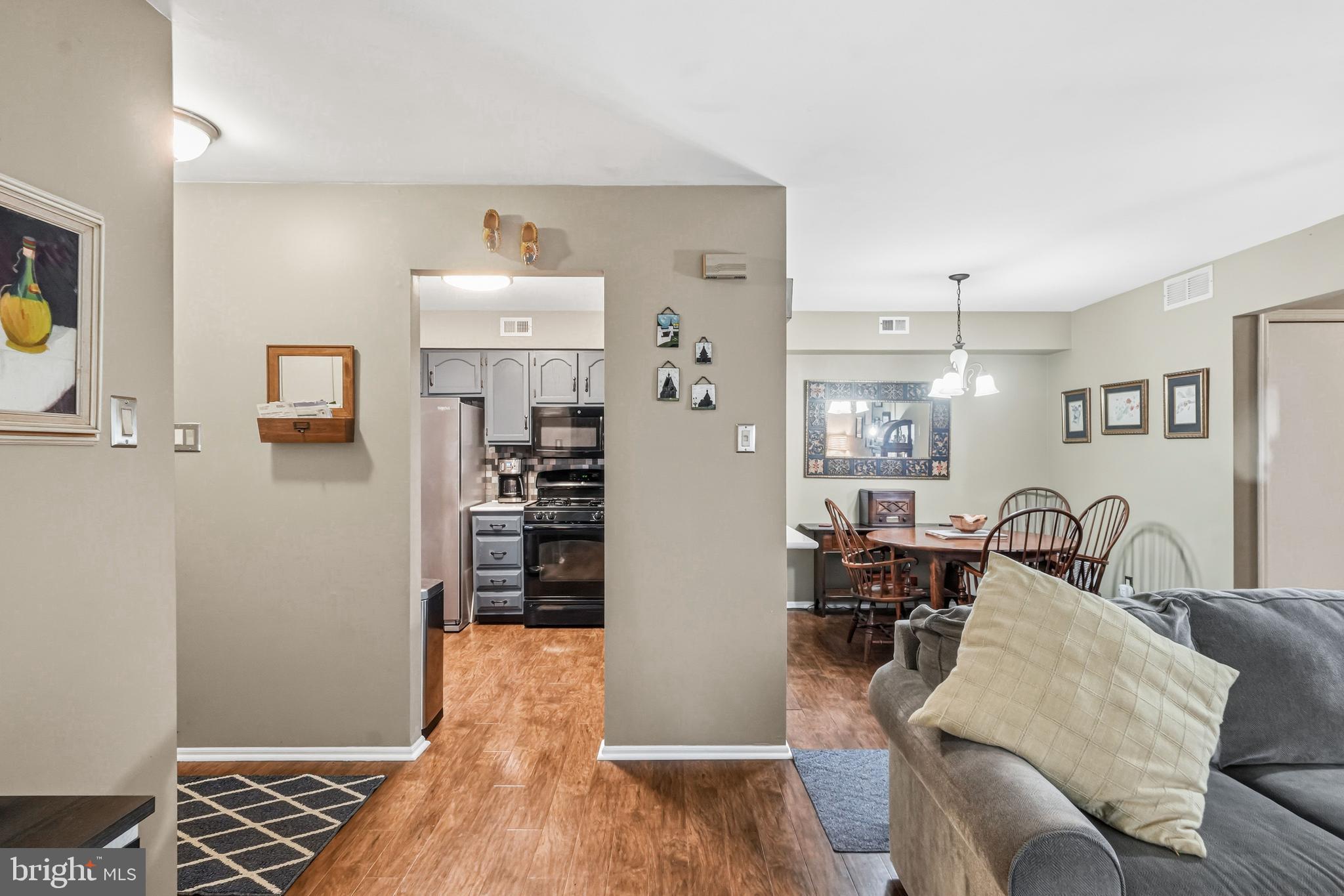 3305A Ramsbury Court Mount Laurel, NJ 08054 - Photo 10 of 27 a living room with furniture and wooden floor
